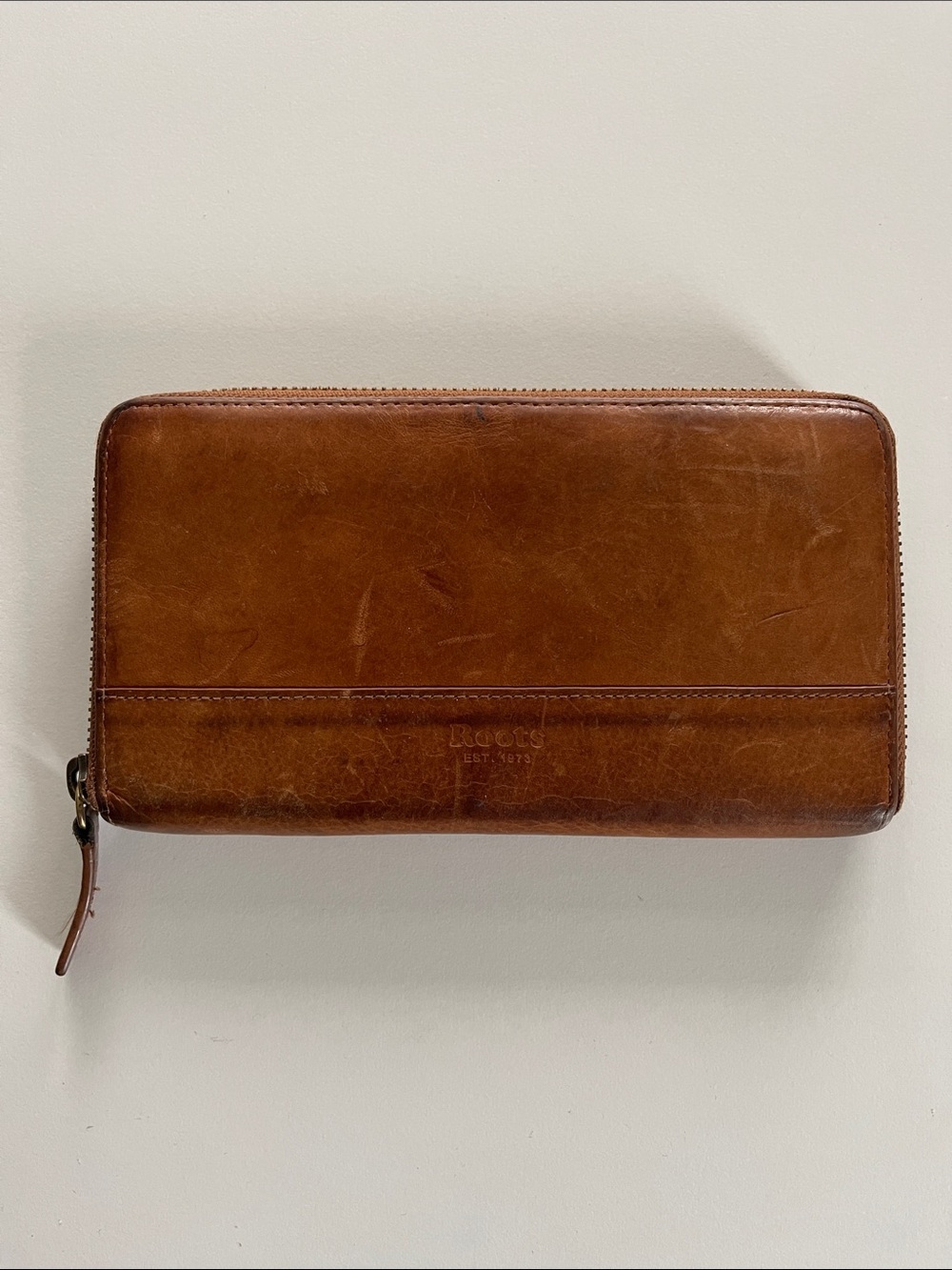Roots Leather Zip-Around Wallet in Chestnut Brown